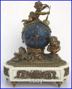 Pendule bronze globe céleste décor putti Ange d'époque XIXe siècle