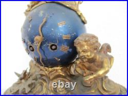 Pendule bronze globe céleste décor putti Ange d'époque XIXe siècle