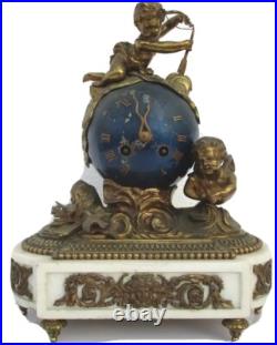 Pendule bronze globe céleste décor putti Ange d'époque XIXe siècle