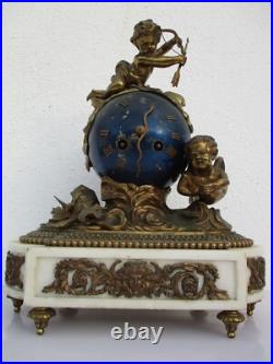 Pendule bronze globe céleste décor putti Ange d'époque XIXe siècle