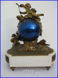 Pendule bronze globe céleste décor putti Ange d'époque XIXe siècle