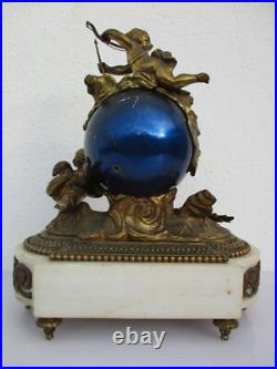 Pendule bronze globe céleste décor putti Ange d'époque XIXe siècle