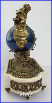 Pendule bronze globe céleste décor putti Ange d'époque XIXe siècle
