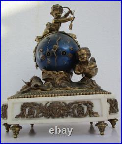 Pendule bronze globe céleste décor putti Ange d'époque XIXe siècle