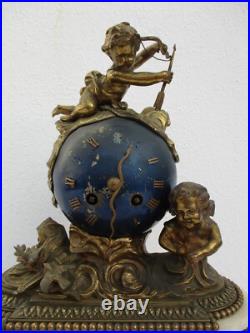 Pendule bronze globe céleste décor putti Ange d'époque XIXe siècle