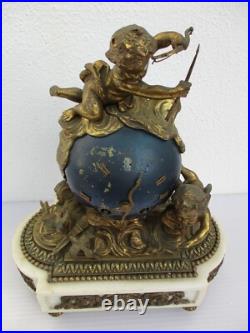 Pendule bronze globe céleste décor putti Ange d'époque XIXe siècle