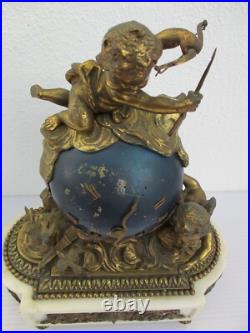 Pendule bronze globe céleste décor putti Ange d'époque XIXe siècle