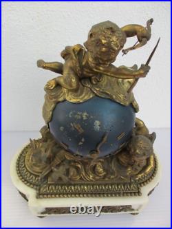Pendule bronze globe céleste décor putti Ange d'époque XIXe siècle