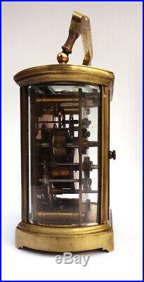 Pendule dit dofficier Bronze Verre bombé Etui dorigine. XIXè siècle Fonctionne