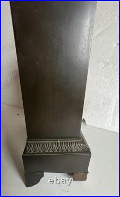 Pendule en bronze a patine verte Style Empire XIX siècle