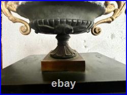 Pendule en bronze a patine verte Style Empire XIX siècle