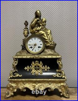 Pendule en bronze doré Vierge à l'Enfant Marbre noir XIXe siècle