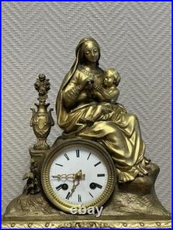 Pendule en bronze doré Vierge à l'Enfant Marbre noir XIXe siècle