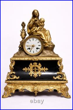 Pendule en bronze doré Vierge à l'Enfant Marbre noir XIXe siècle