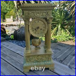 Pendule portique empire bronze ciselé, XIX siècle H cm53