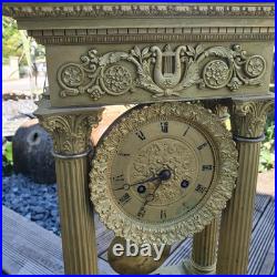 Pendule portique empire bronze ciselé, XIX siècle H cm53