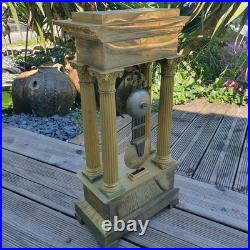 Pendule portique empire bronze ciselé, XIX siècle H cm53