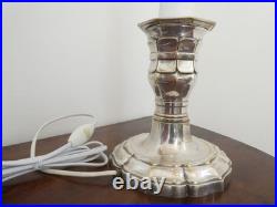 Pied de la lampe en bronze argenté pique-cierge, XIXe siècle