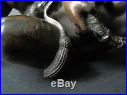 Putto en bronze soufflant dans une conque angelot musicien conch XIXe siècle
