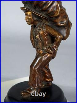Pyrogène bronze livreur de charbon Fin du XIXe siècle C078
