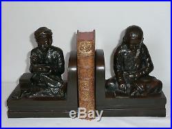 Serre livres en bronze chinois patiné Asie décor de lettré fin XIX siècle Chine