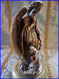 Statue religieuse, Archange Raphaël et Tobie enfant. XIX ème siècle