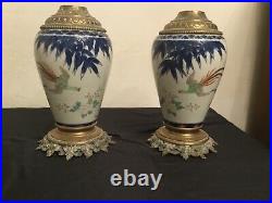 # paire de lampes à pétrole en porcelaine de chine Imari et bronze. XIX siècle