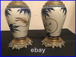 # paire de lampes à pétrole en porcelaine de chine Imari et bronze. XIX siècle